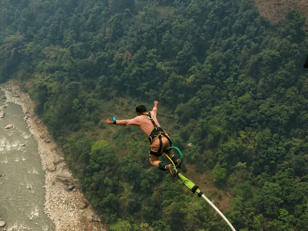 Jumping into valley during bungee jump