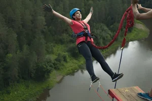 Bungee jump over river and forest